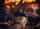 Blusy Man copertina album insegna luminosa sfondo musicisti